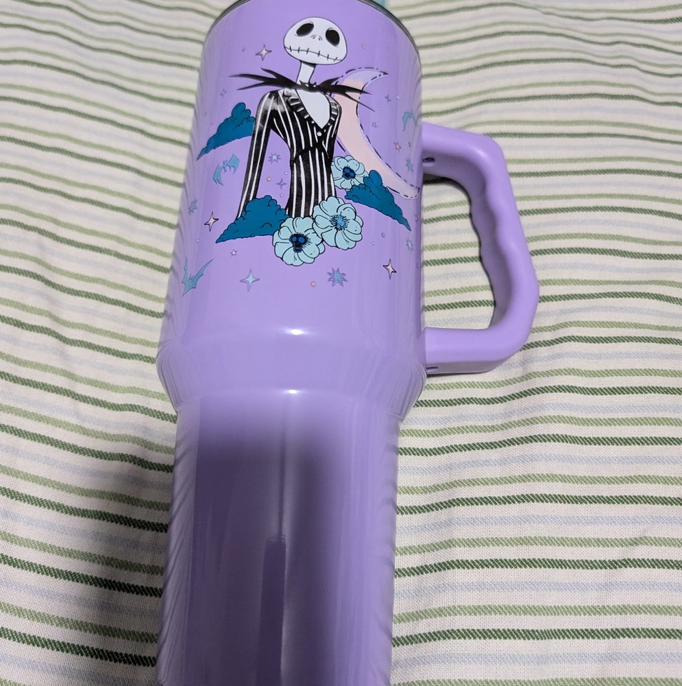 NEW DISNEY JACK SKILLERN SILVER BUFFALO PURPLE 40 OZ TUMBLER